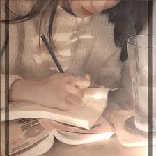 Portrait of a famous author with glasses and a book